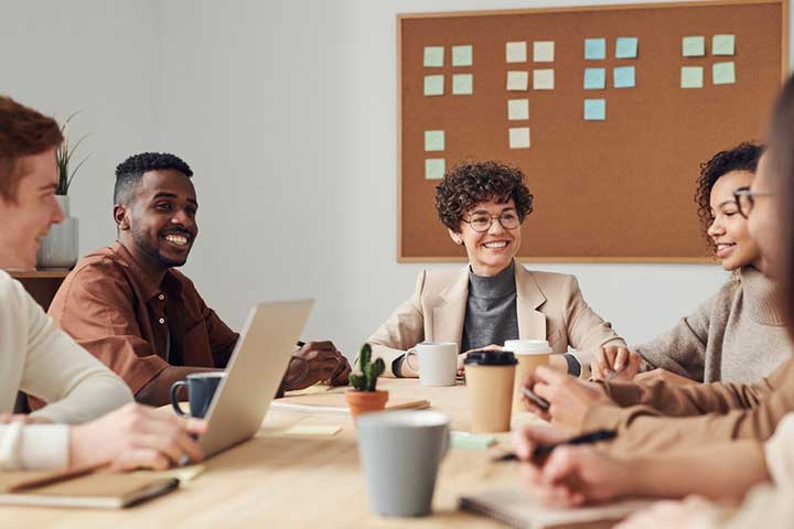 About Us 3 tech startup team member meeting